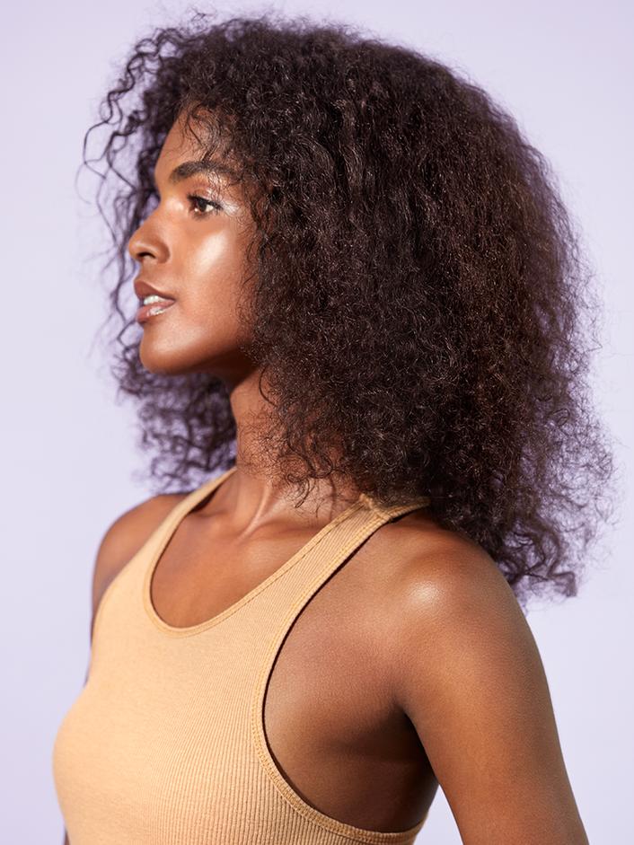 Side profile look of hair before product use