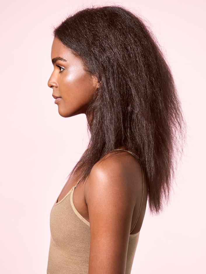Side profile look of hair before product use
